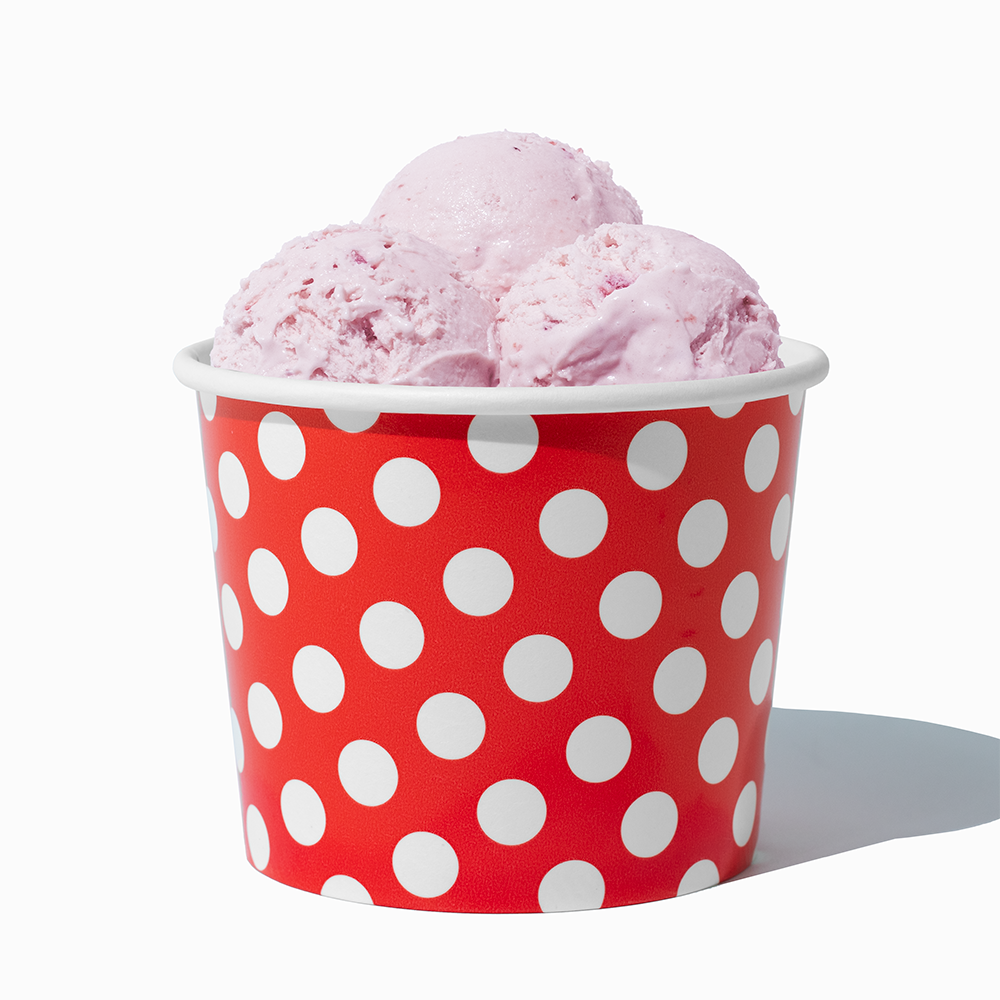 12 oz Red Polka Dot paper food bowl shown with a large serving of frozen dessert