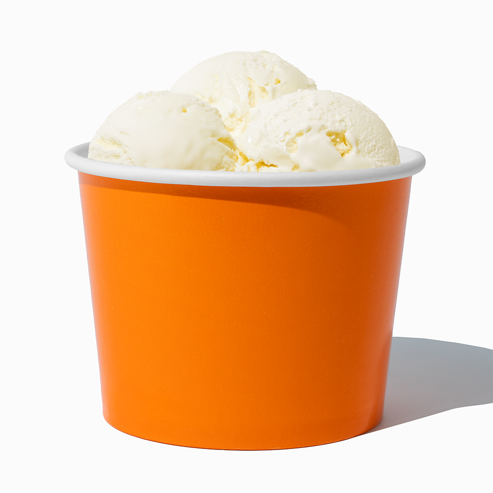 16 oz Orange paper pint container filled with a family-sized ice cream portion