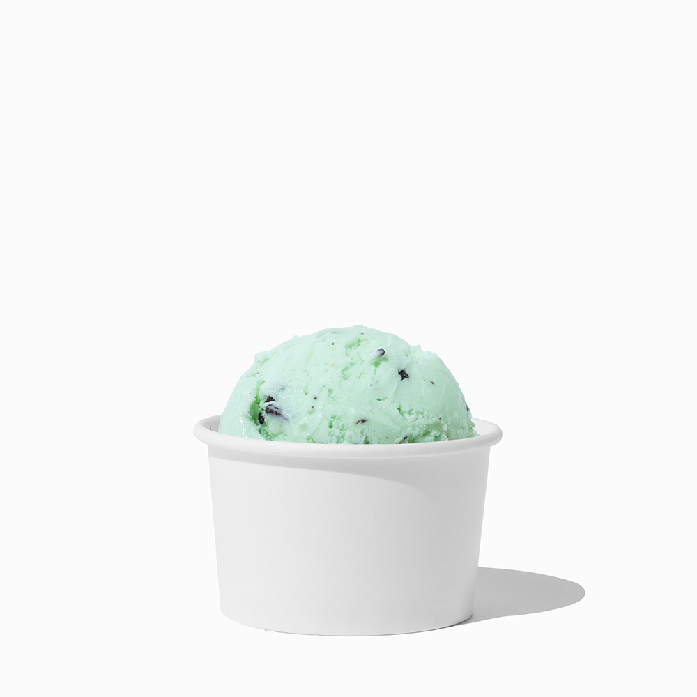 3 oz White paper cup filled with a mini ice cream scoop for portioned food tasting.