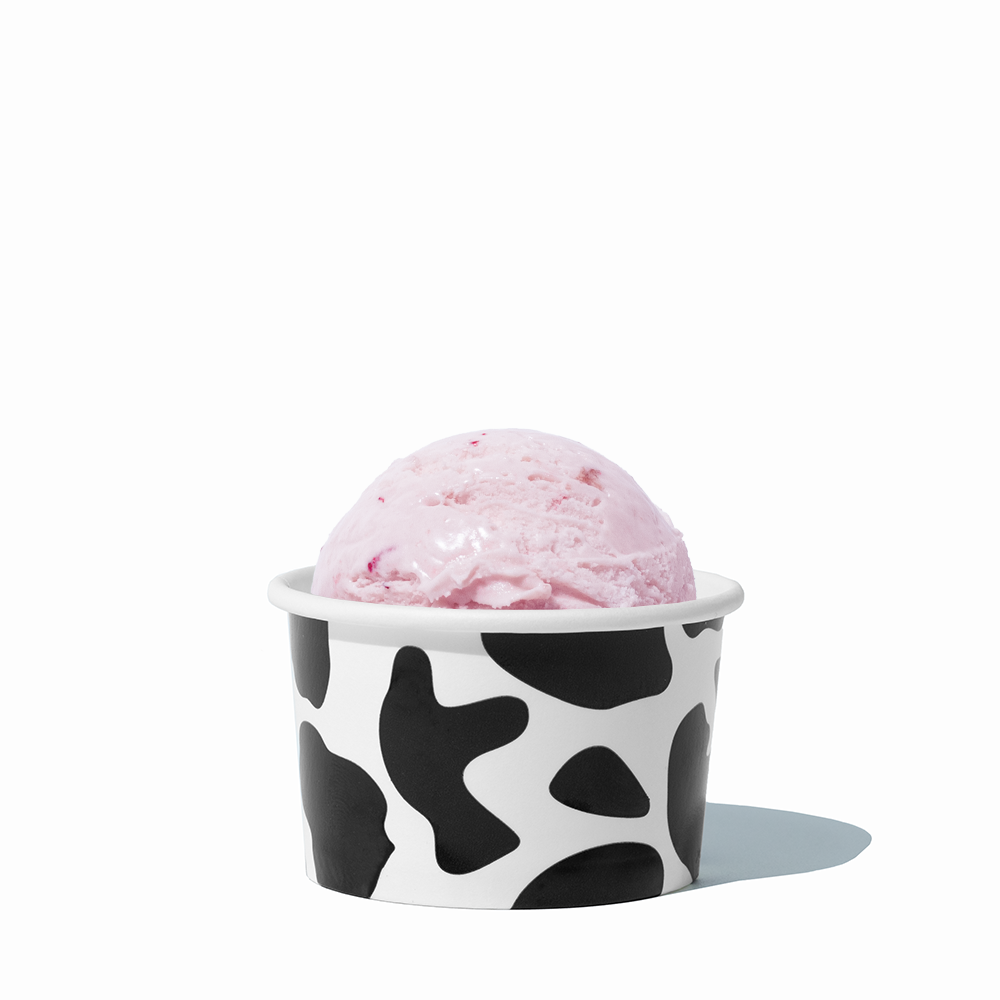 4 oz Cow Print ice cream cup shown with a fresh scoop of dessert for party catering