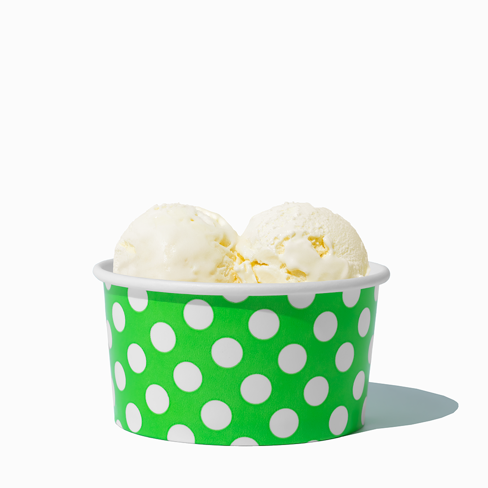 6 oz Green Polka Dot paper ice cream bowl filled with a scoop of ice cream