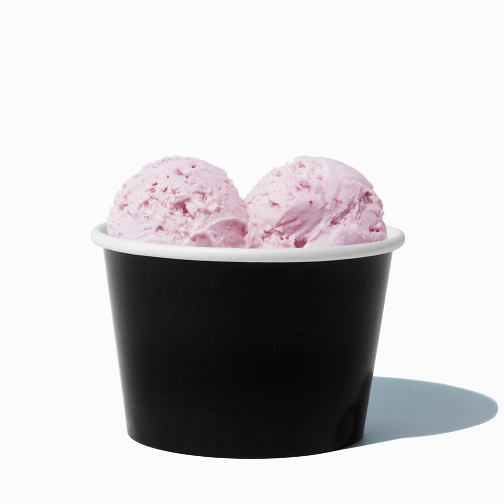 8 oz Black bulk ice cream container filled with two scoops of cold treats