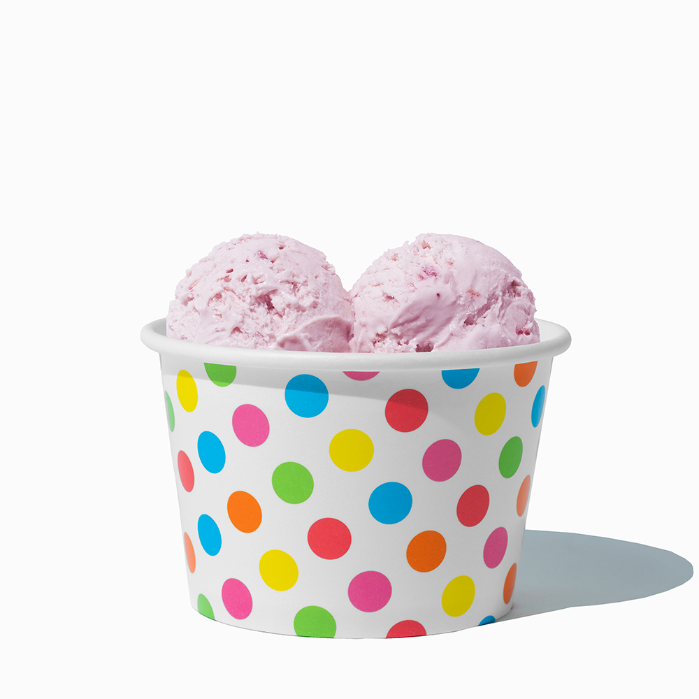 8 oz Rainbow Polka Dot bulk ice cream container filled with two scoops of cold treats