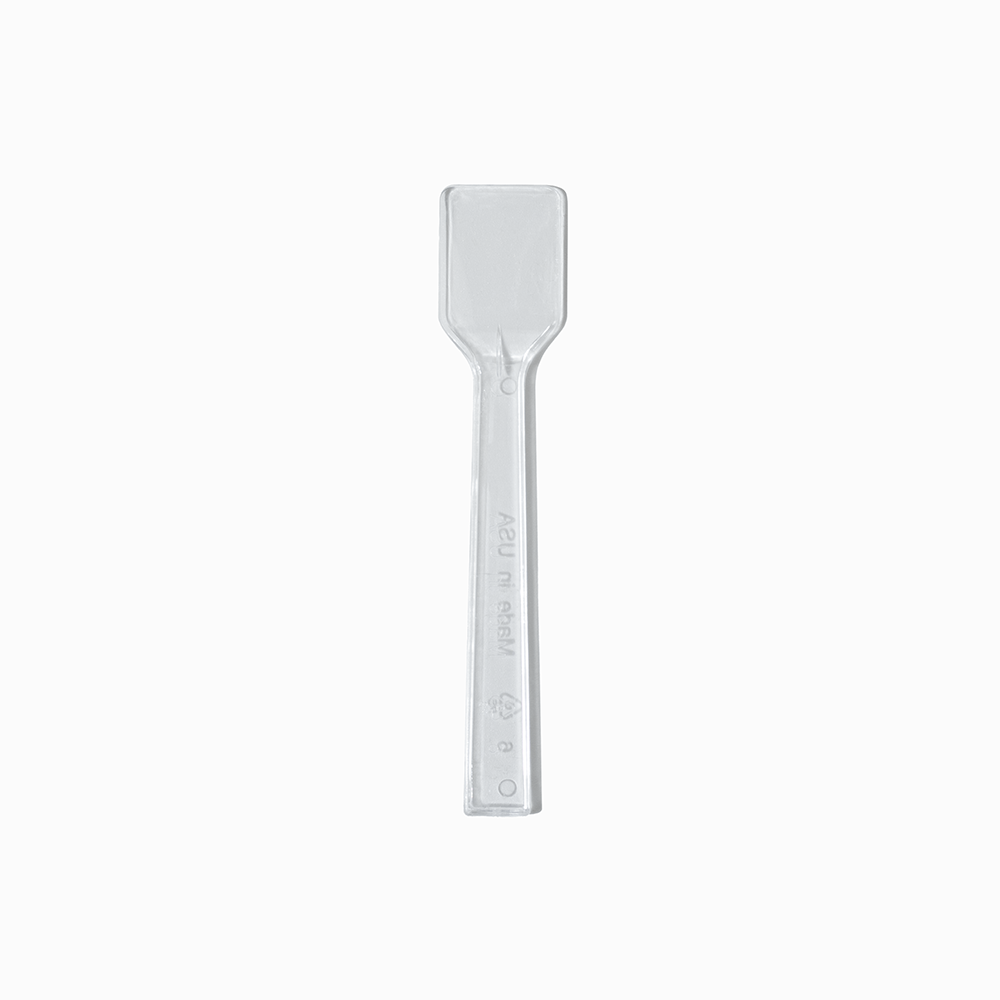 Clear flat-edge plastic gelato spoon - Single close-up for a clean commercial aesthetic.