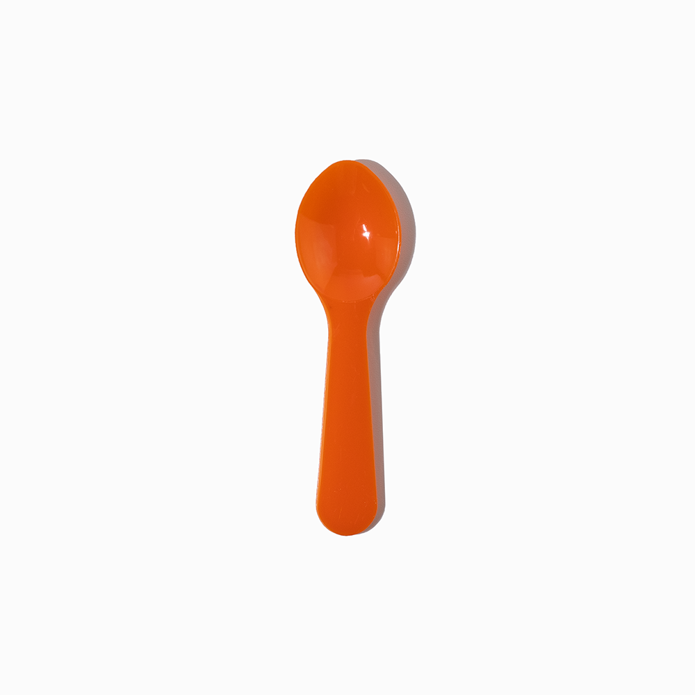 Orange 3-inch mini plastic tasting spoon - Single close-up for gelato and sorbet shops.