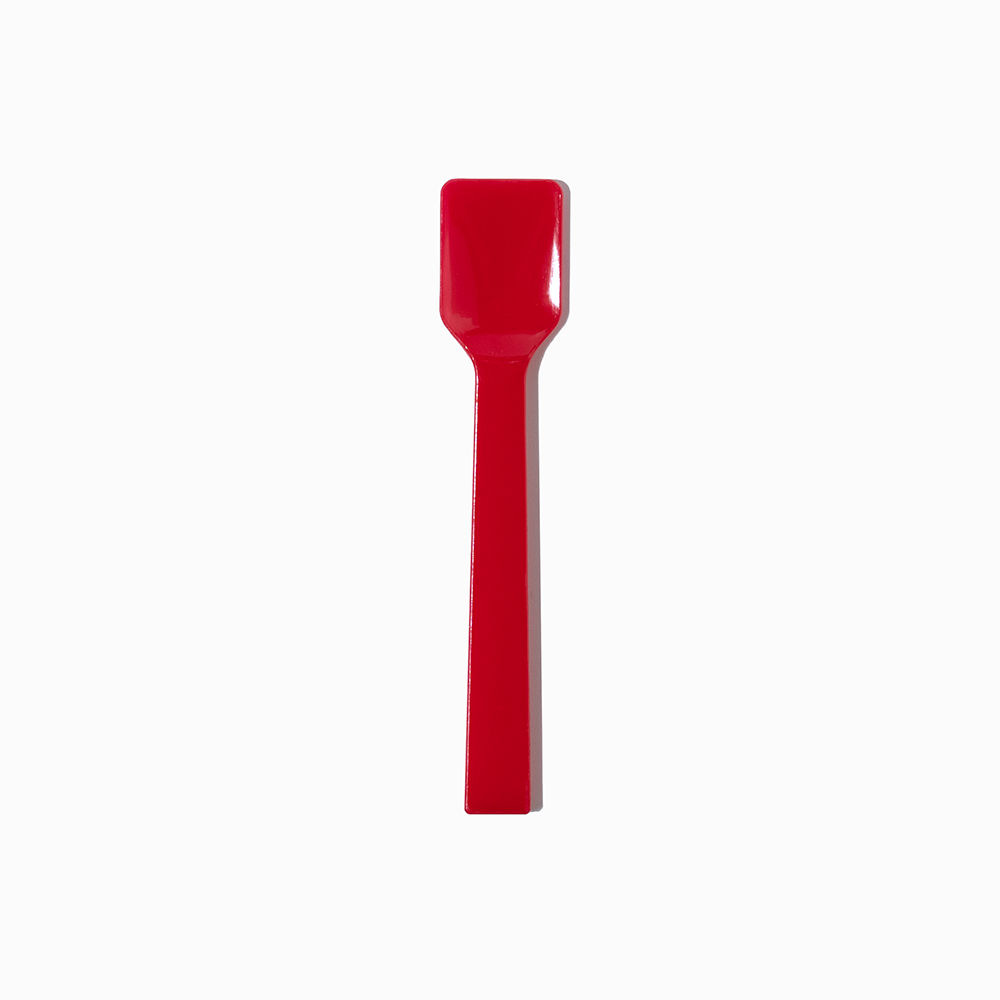 Red flat-edge plastic gelato spoon - Single close-up for commercial Italian ice presentation.
