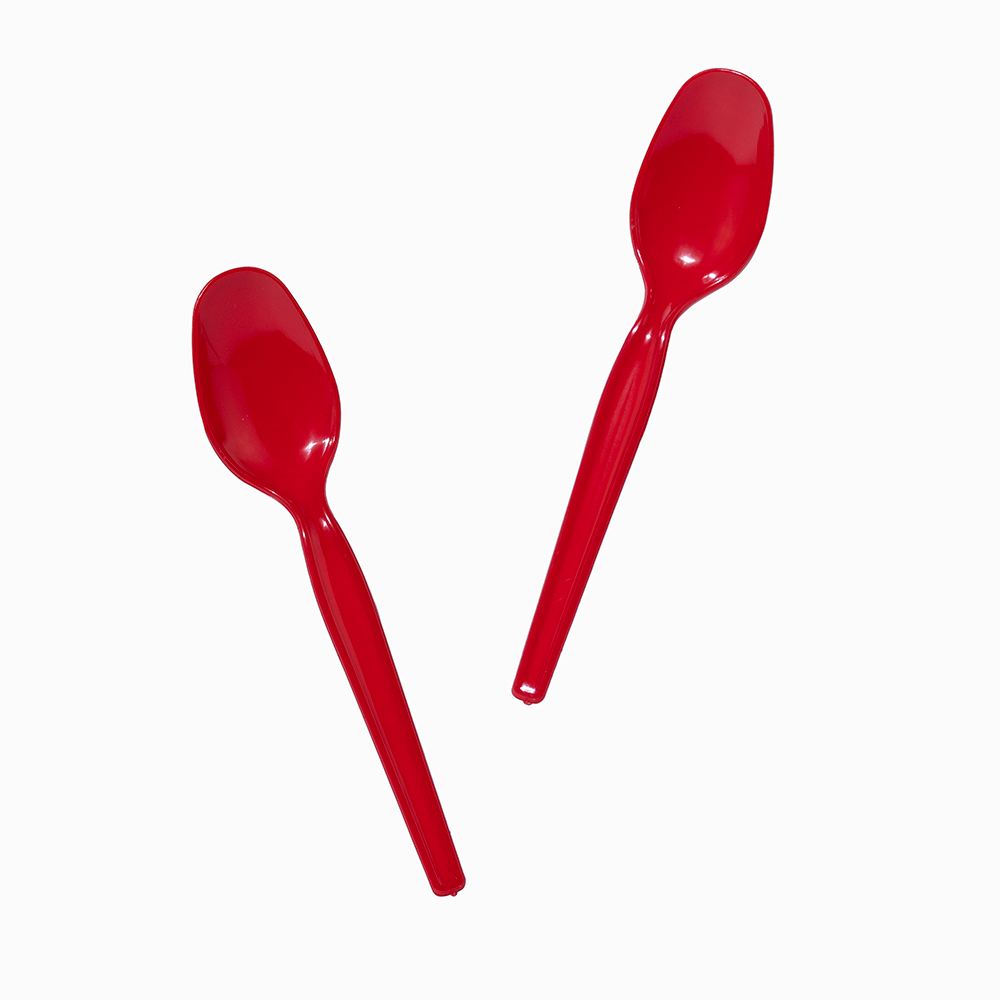 Red durable super dessert spoons angled for serving classic sundaes.