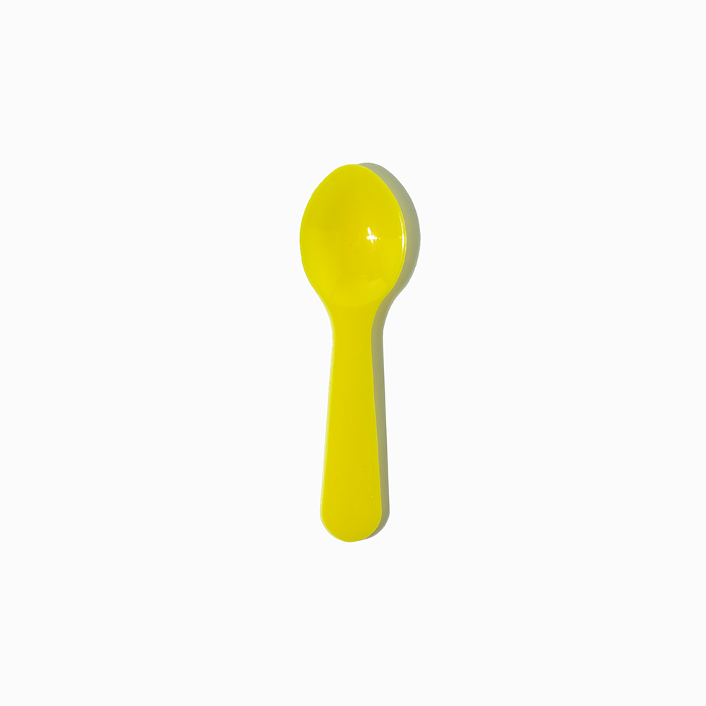 Yellow 3-inch plastic taster spoon - Single close-up for ice cream parlor sampling.