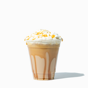 UNIQ 12 oz clear PET plastic cup showcasing a fresh iced latte with condensation, highlighting crystal-clear visibility for wholesale cafe cold drink service.