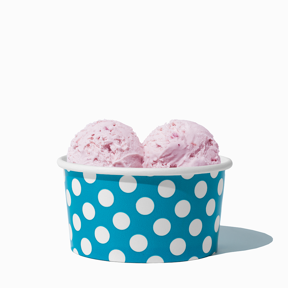 6 oz Blue Polka Dot paper ice cream bowl filled with a scoop of ice cream