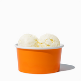 6 oz Orange paper ice cream bowl filled with a scoop of ice cream