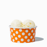 6 oz Orange Polka Dot paper ice cream bowl filled with a scoop of ice cream
