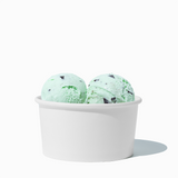 6 oz White paper ice cream bowl filled with a scoop of ice cream