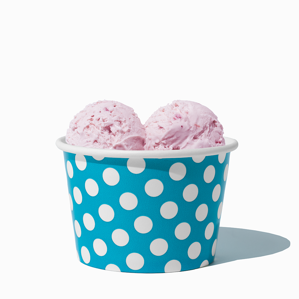 8 oz Blue Polka Dot bulk ice cream container filled with two scoops of cold treats