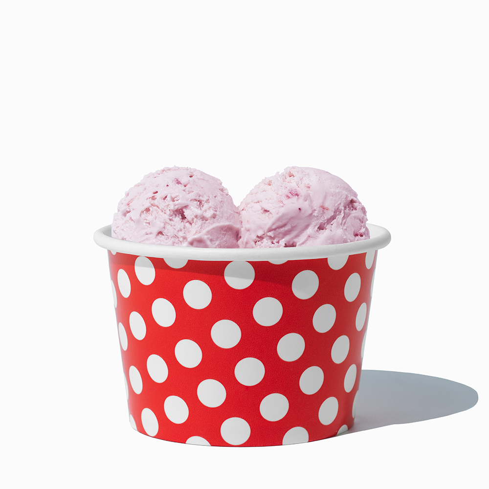 8 oz Red Polka Dot bulk ice cream container filled with two scoops of cold treats