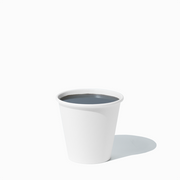 UNIQ 8 oz single-wall white hot paper coffee cup with premium leak-proof lining for wholesale foodservice and cafes.