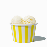 8 oz Yellow Striped bulk ice cream container filled with two scoops of cold treats