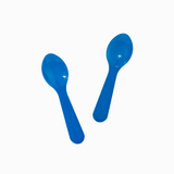 Blue plastic tasting spoons in action for scooping thick hand-dipped ice cream samples.