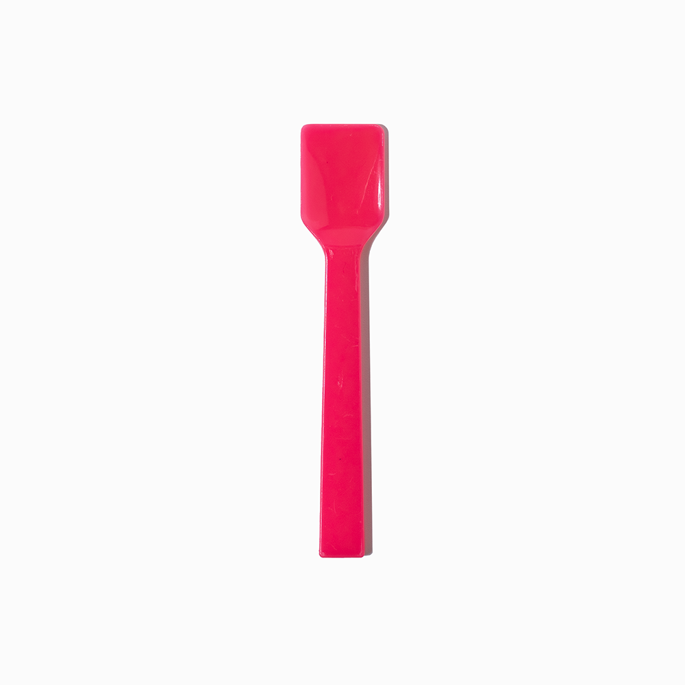 Pink flat-edge plastic gelato spoon - Single close-up for vibrant gelato presentation.
