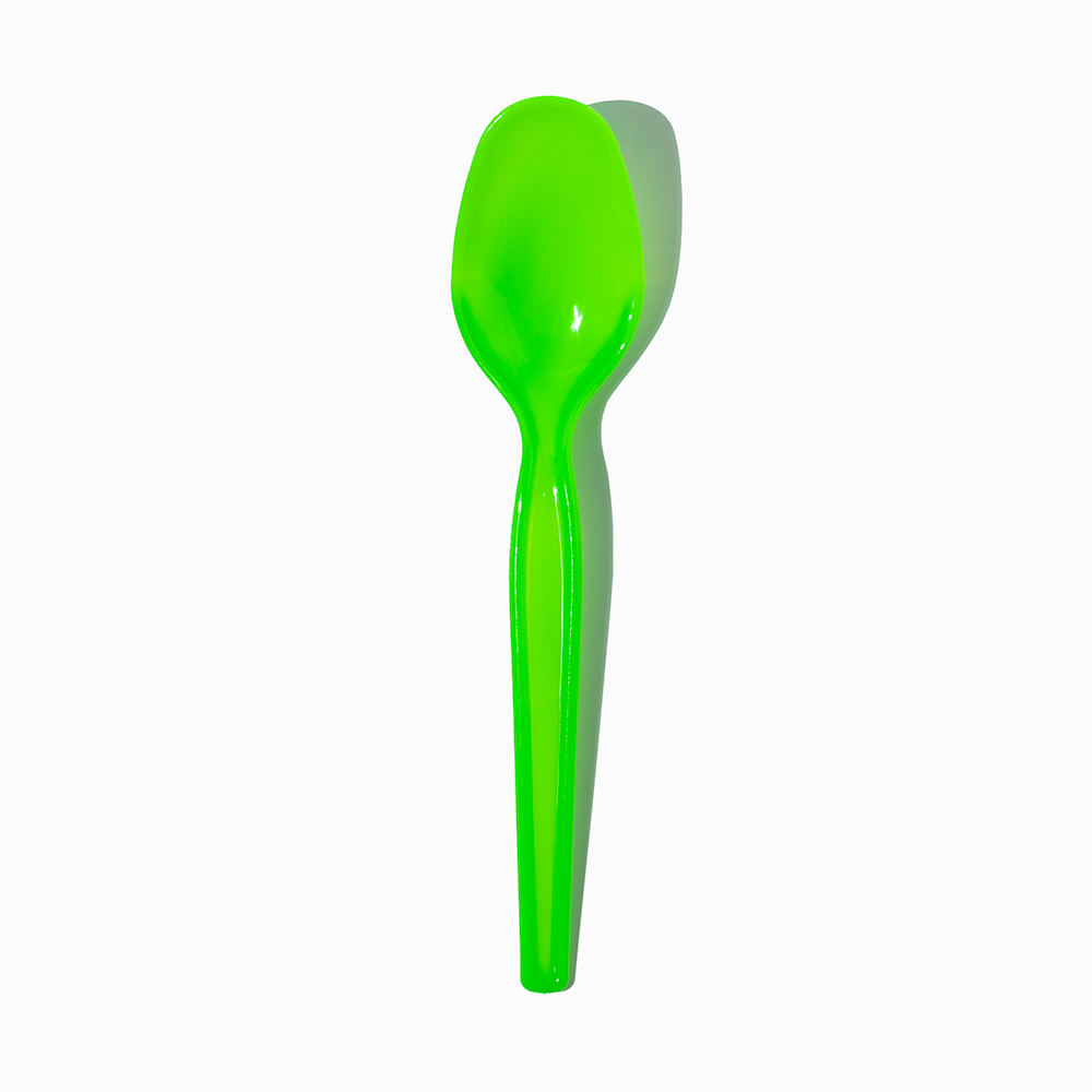 Green super dessert plastic spoon - Single close-up for commercial frozen yogurt shops.