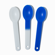 White to blue color-changing heavy-duty plastic ice cream spoons reacting to cold treats.