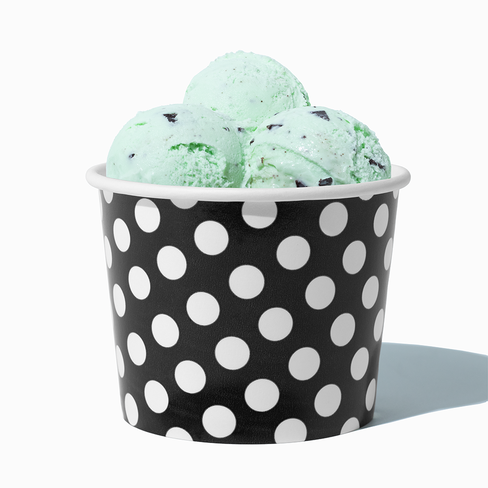 12 oz Black Polka Dot paper food bowl shown with a large serving of frozen dessert