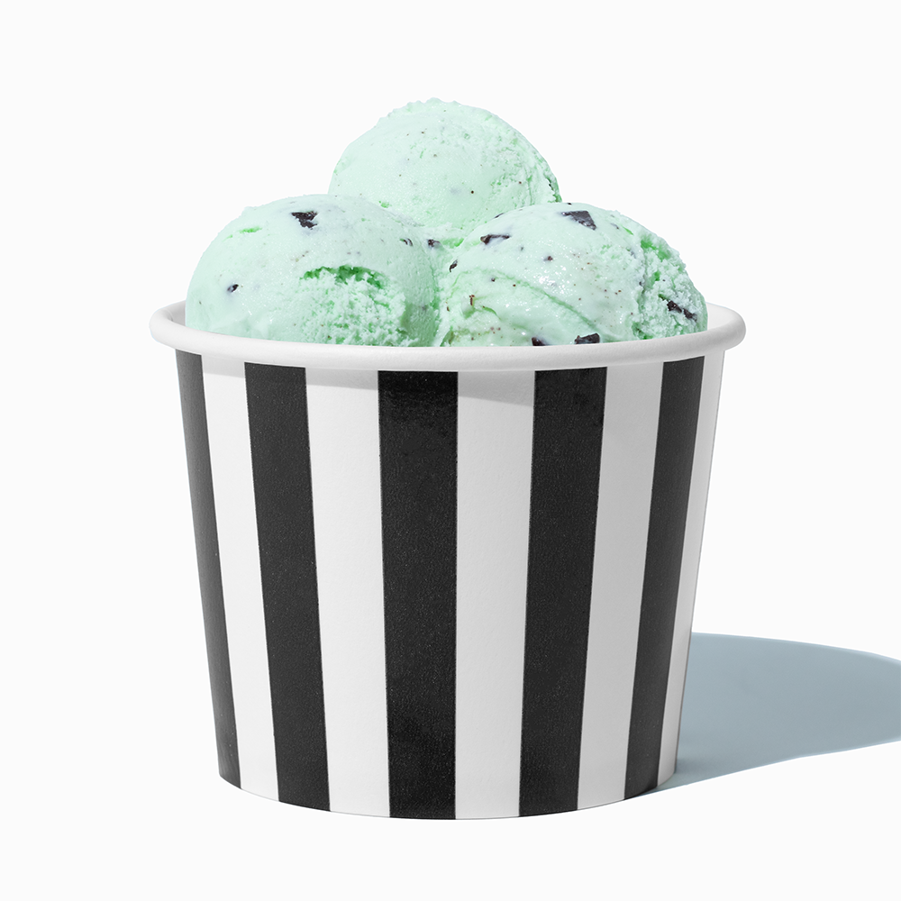 12 oz Black Striped paper food bowl shown with a large serving of frozen dessert
