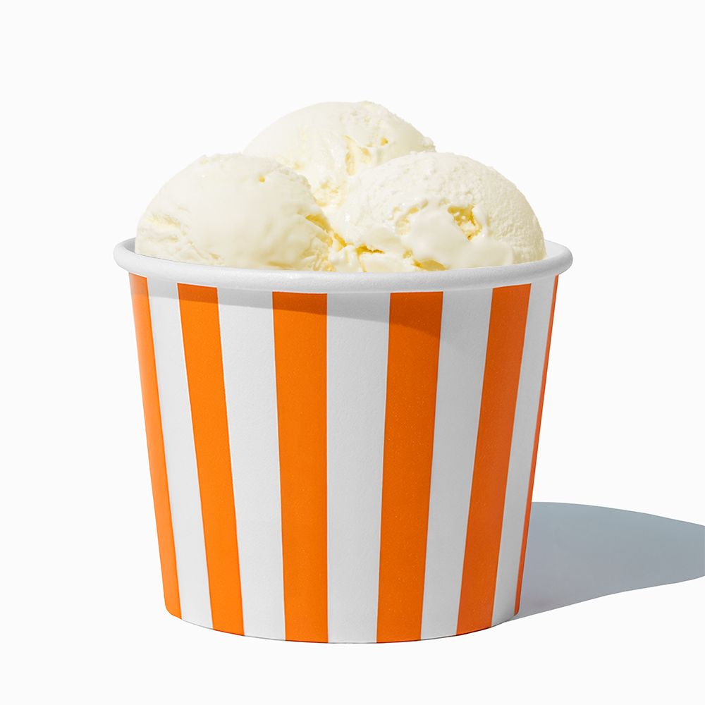 12 oz Orange Striped paper food bowl shown with a large serving of frozen dessert