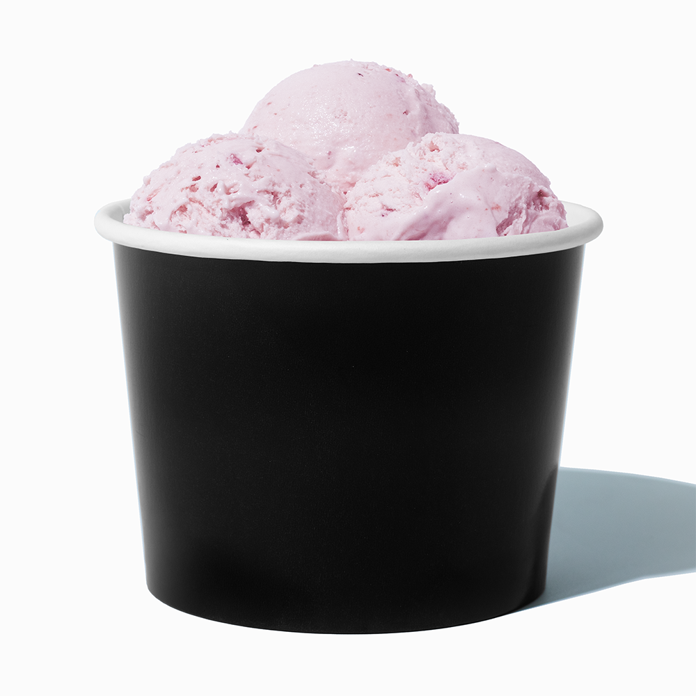 16 oz Black paper pint container filled with a family-sized ice cream portion