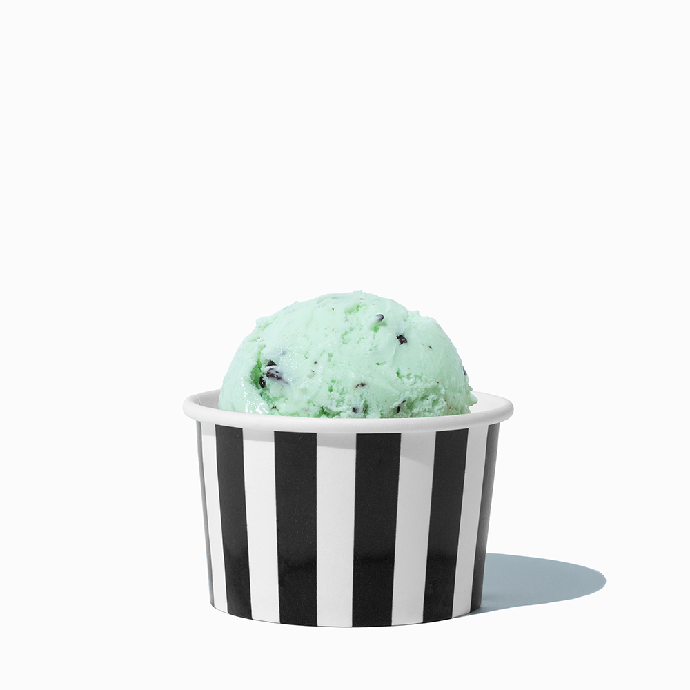4 oz Black Striped ice cream cup shown with a fresh scoop of dessert for party catering