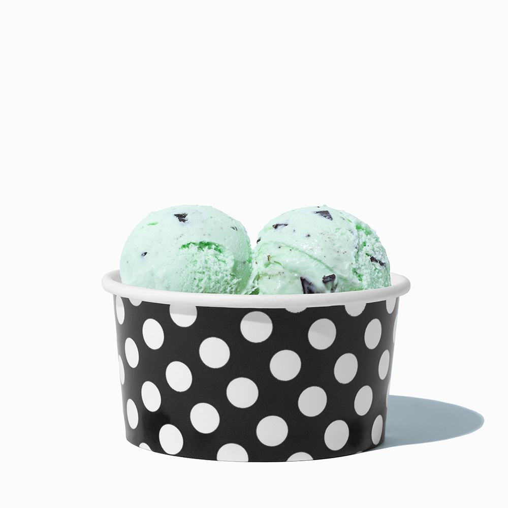 6 oz Black Polka Dot paper ice cream bowl filled with a scoop of ice cream