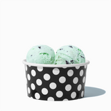 6 oz Black Polka Dot paper ice cream bowl filled with a scoop of ice cream