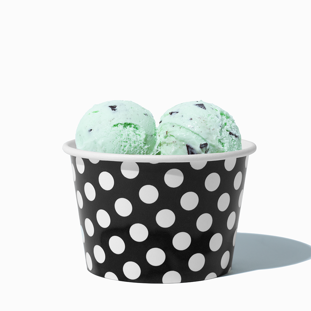 8 oz Black Polka Dot bulk ice cream container filled with two scoops of cold treats