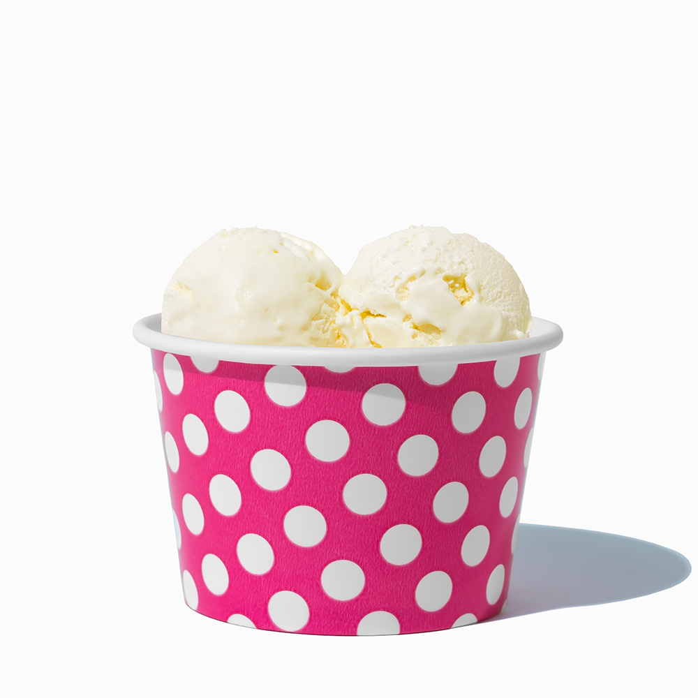 8 oz Pink Polka Dot bulk ice cream container filled with two scoops of cold treats